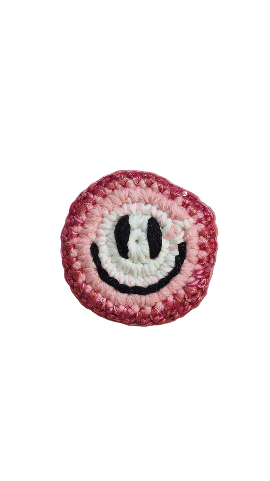 Hand-crochet acid house face badge rainbow burst multicolour 90s rave pin Free Range Smilies Qravers London
