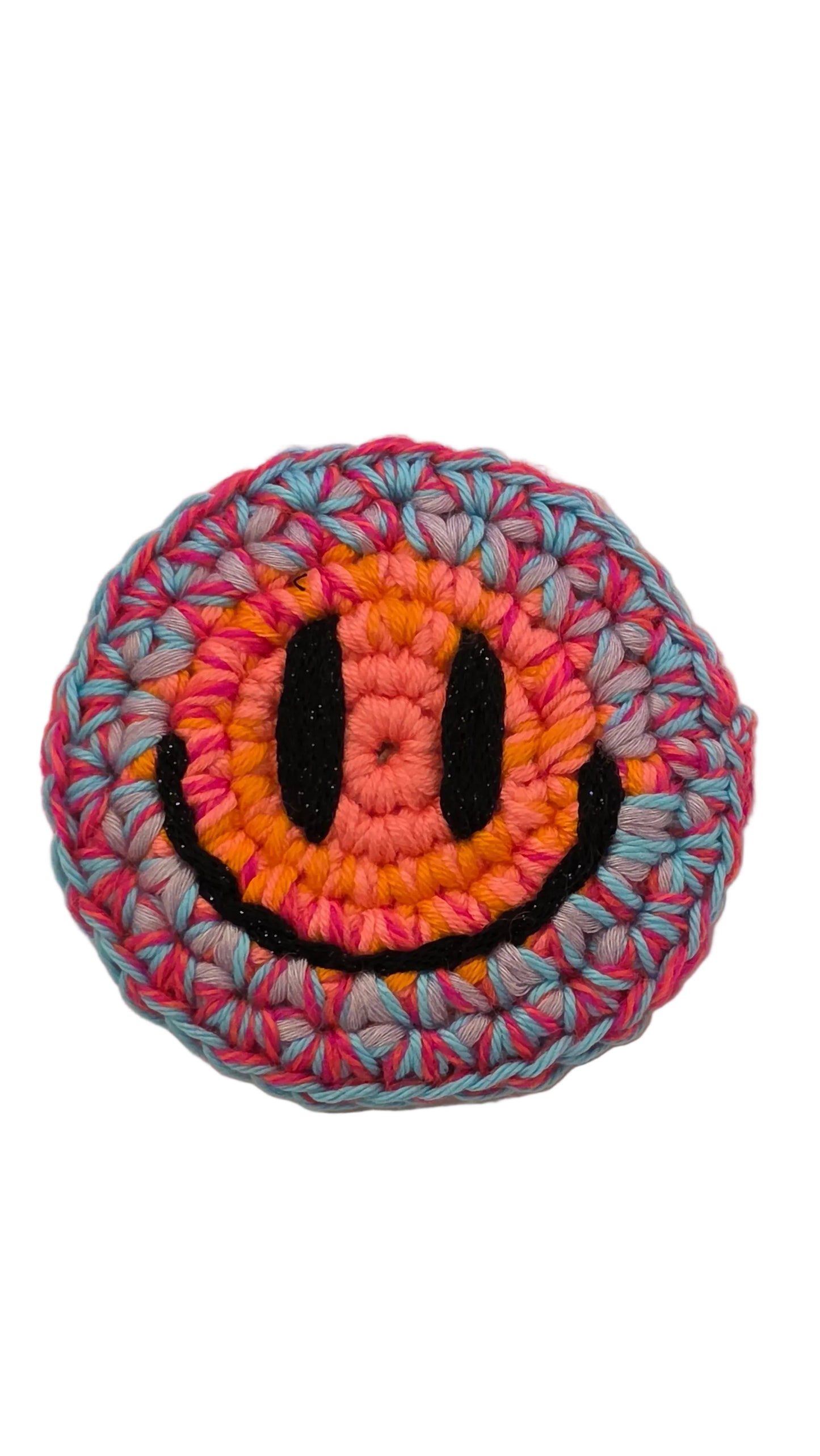 Hand-crochet acid house face badge hot pink halo gradient 90s rave pin Free Range Smilies Qravers London
