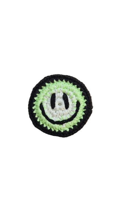 Hand-crochet acid house face badge neon fade multicolour gradient 90s rave pin Free Range Smilies Qravers London