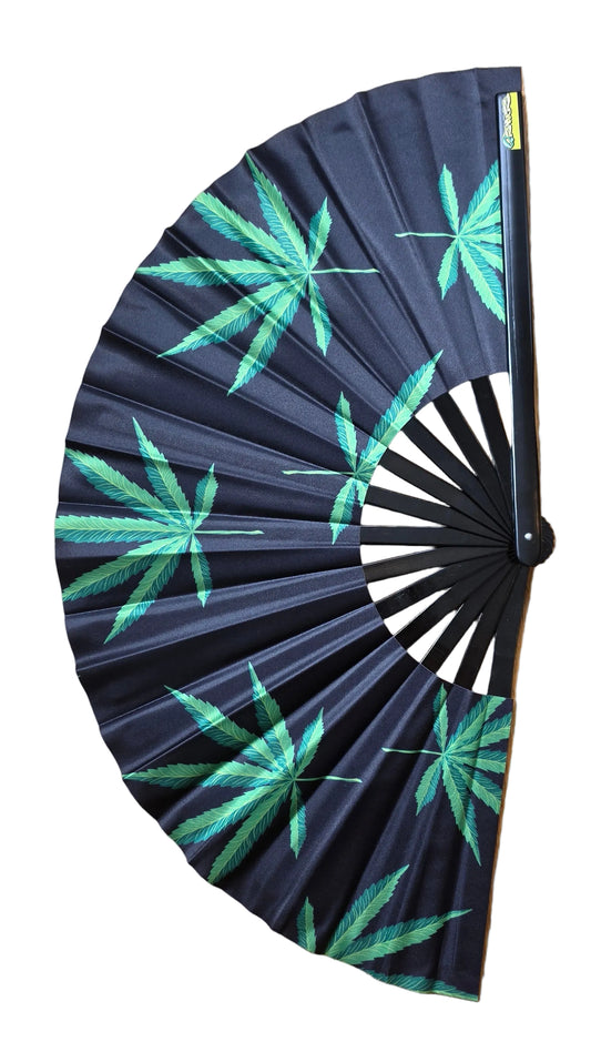 Black fan with green leaf patterns on a white background