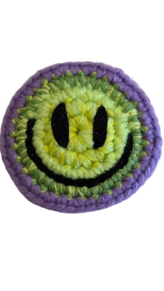 Hand-crochet acid house face badge rainbow burst multicolour 90s rave pin Free Range Smilies Qravers London