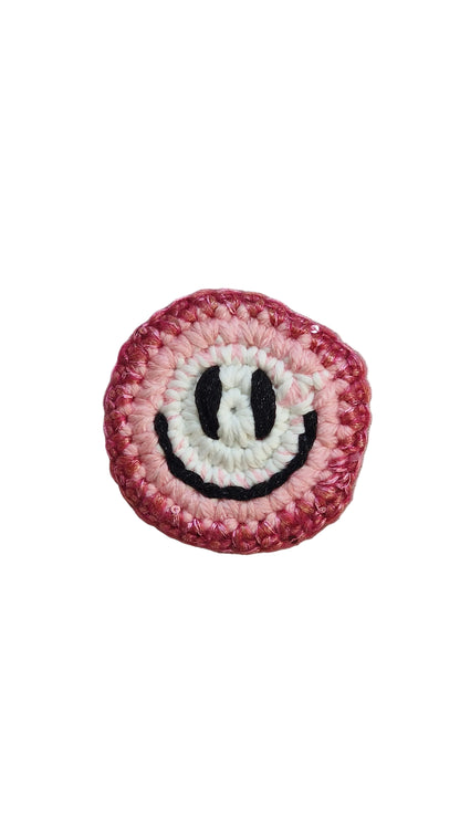 Hand-crochet acid house face badge rainbow burst multicolour 90s rave pin Free Range Smilies Qravers London