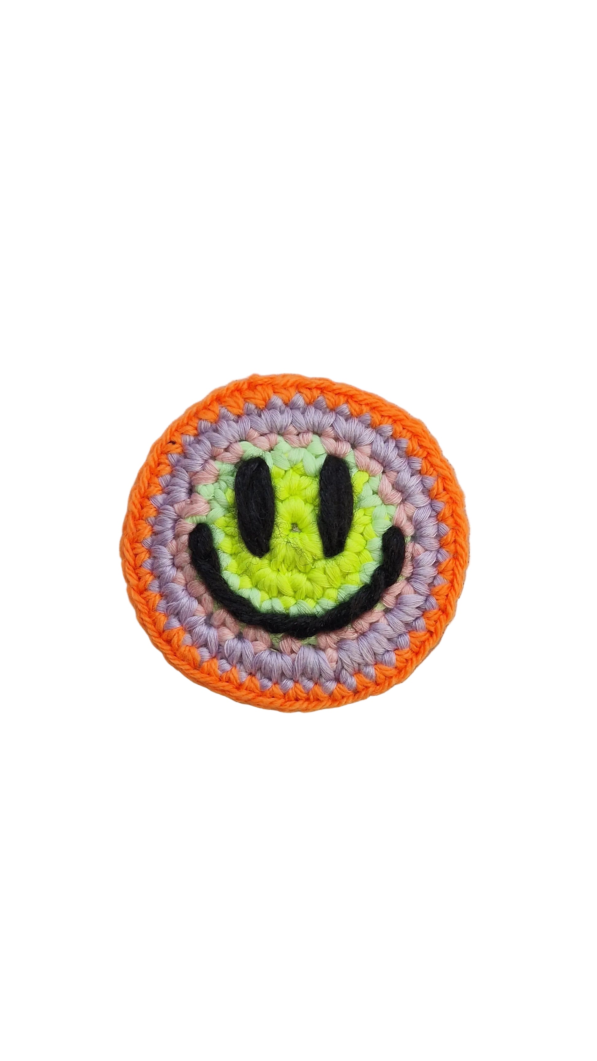 Hand-crochet acid house face badge sunset acid orange yellow gradient 90s rave pin Free Range Smilies Qravers London