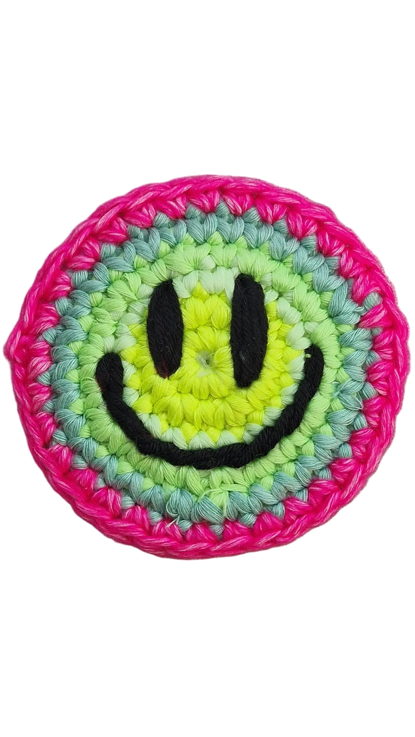 Hand-crochet acid house face badge rainbow burst multicolour 90s rave pin Free Range Smiles Qravers London